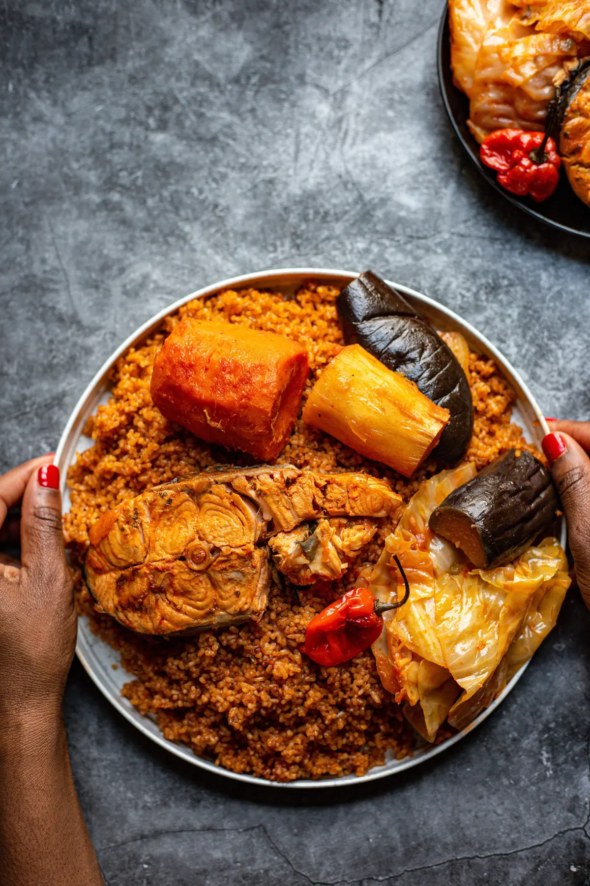 Jollof thieboudienne platter with fish and vegetables